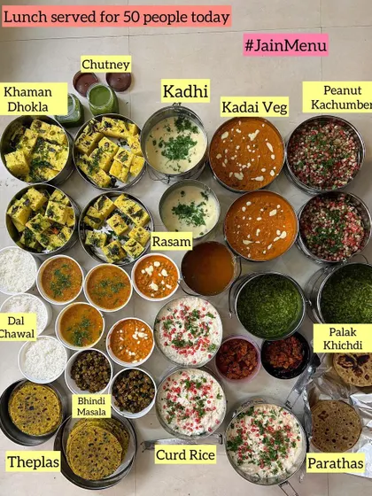I love cooking for your gatherings. This was a delicious Jain menu lunch I prepared for 50 people, featuring a wide spread of dishes like Kadhi, Kaju Masala, Palak Khichdi, and fresh Theplas.