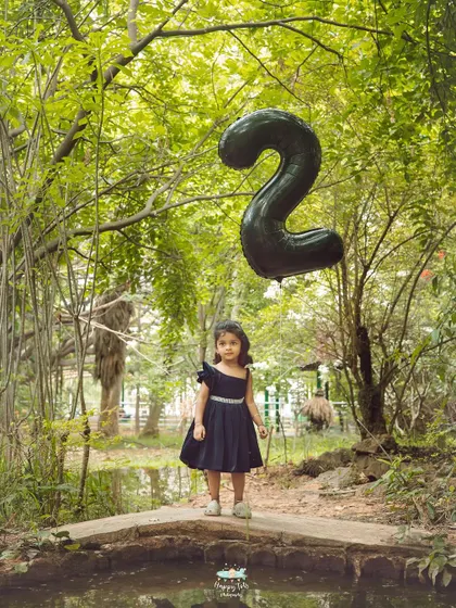A wider view of the second birthday shoot, showing how the natural landscape of the park creates a stunning backdrop for milestone photos.