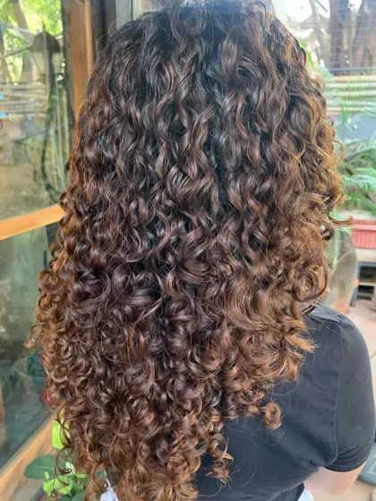 Curls, swirls, and a touch of magic. A gorgeous transformation for these yum ringlets with a non-bleach color. (No filter)