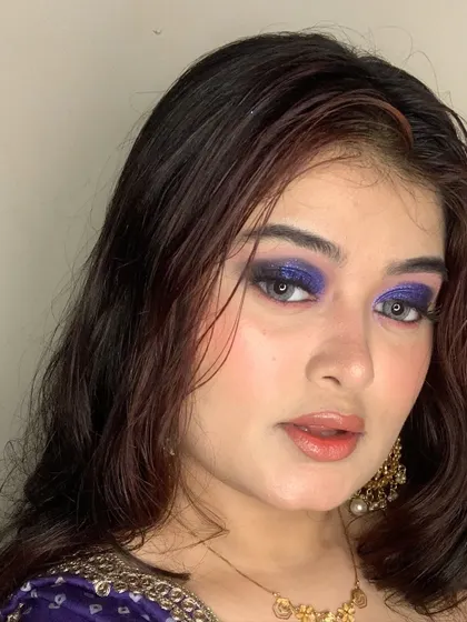 A close-up showing the blend of the purple and black eyeshadows.