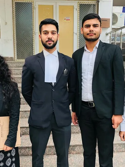 With my team and interns outside a district court. I believe in mentoring the next generation of lawyers by providing them with practical exposure to court proceedings and case management.