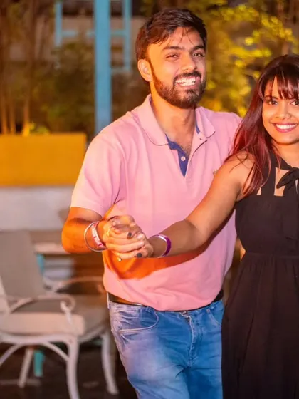 A happy and energetic pair enjoying the music. The smiles are infectious.