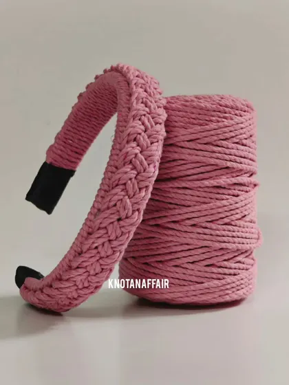 This beautiful macrame hairband in baby pink is made with a four-strand braid pattern. It was part of a custom order and has become one of my bestsellers.