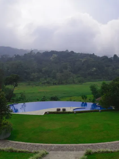 I believe that recharging means finding peace in beautiful surroundings. This infinity pool overlooking the misty hills of Coorg is just one example of the premium, serene accommodations I arrange for corporate offsites.