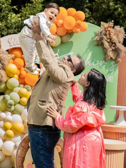 A joyful family moment at a safari-themed first birthday. Our goal is to create a beautiful setting that becomes the backdrop for cherished family memories.