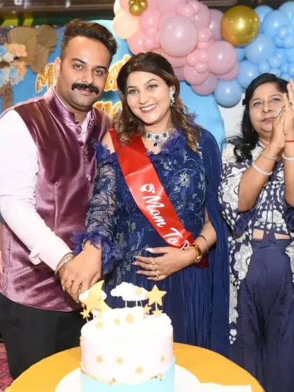 Another angle of the cake-cutting, capturing the joy and support of the family.