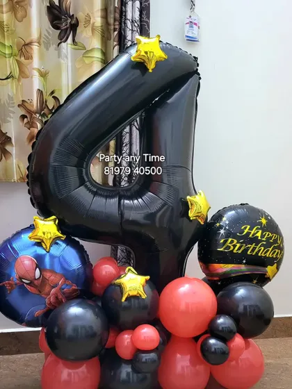 A Spider-Man themed 4th birthday bouquet with a large black foil number and character balloon.