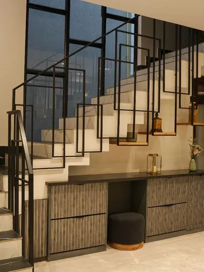 Another view of the staircase, showing how the open design creates a sense of spaciousness and draws the eye upwards.