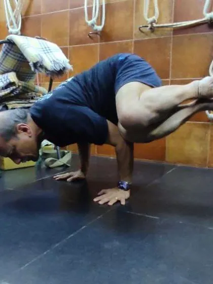 Bakasana (Crow Pose), a foundational arm balance that teaches the principles of lift and balance.