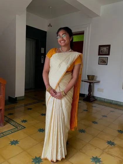 Sisters Shruthi and Shwetha, visiting from the USA for a cousin's wedding. I draped them in these elegant, simple sarees that were perfect for the occasion.