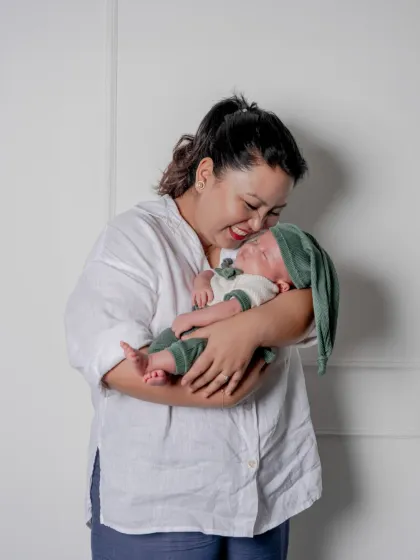 In her arms, the world is calm. I love capturing the peaceful, loving moments between a mother and her sleeping baby.