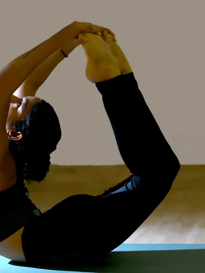 Reaching for my feet in Dhanurasana (Bow Pose). Every small step in practice is a giant leap for your well-being.
