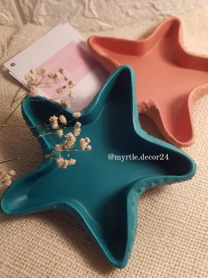 Two of our starfish trinket dishes in teal and a soft peach. These colors complement each other beautifully and bring a gentle, coastal vibe.