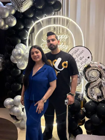 Happy clients enjoying their custom 28th birthday setup. Our backdrops are designed to be the perfect spot for capturing memories with loved ones.