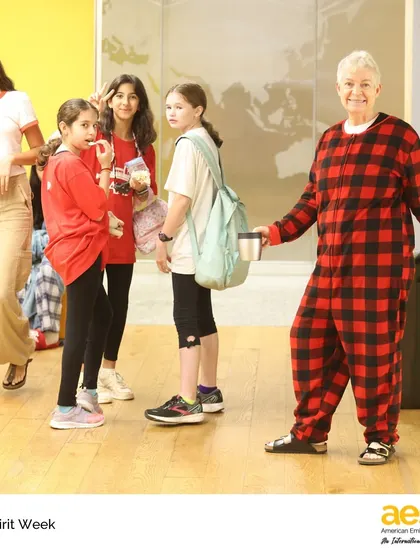Even our middle school principal gets into the spirit during MS Spirit Week! Here she is in a plaid pajama onesie, reminding us all that school is a place for joy and being silly together.