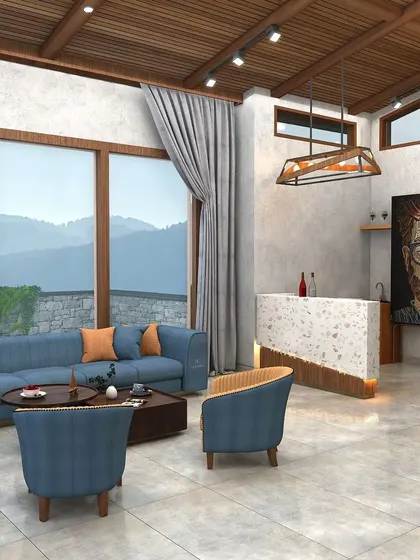 This rustic-modern lounge in Nainital features a tapered wooden ceiling, concrete-textured walls, and a comfortable blue L-shaped sofa to enjoy the mountain views.
