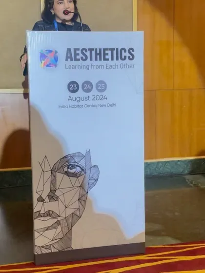 Dr. Kritika Pandey conducting a workshop on Botox and fillers at the Aesthetics Delhi conference. Her expertise in injectables is a core part of our anti-aging and facial contouring services.