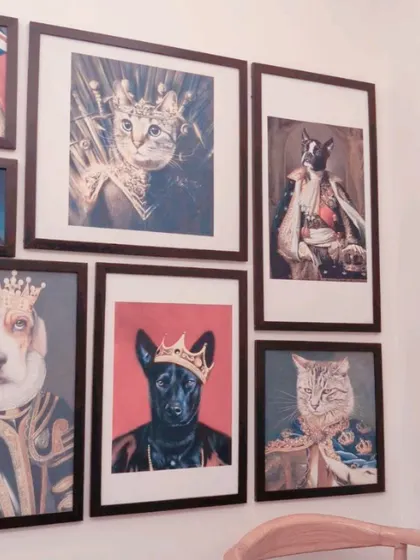 Our wall of fame! We celebrate pets as royalty, and our unique wall art adds to the fun and loving atmosphere of our salon.