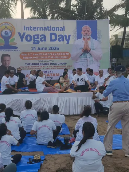 Another perspective of the group session, showing participants fully engaged in the guided meditation. The combination of the beach environment and the tabla's rhythm creates a uniquely serene and powerful healing atmosphere.