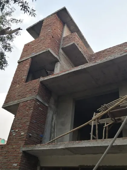 In the making. The brickwork stage is where the architectural form truly begins to assert itself.