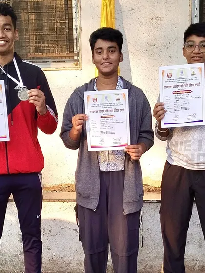 Our state championship medalists proudly displaying their certificates.