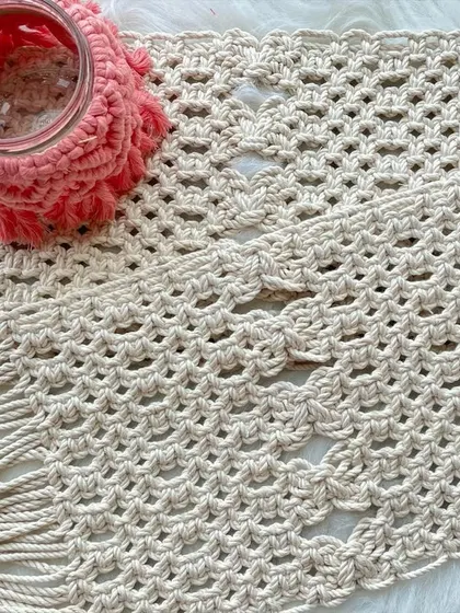 These rectangular macrame table mats or placemats add a beautiful, handcrafted feel to any dining setting. The intricate pattern and fringed edges are sure to impress your guests.