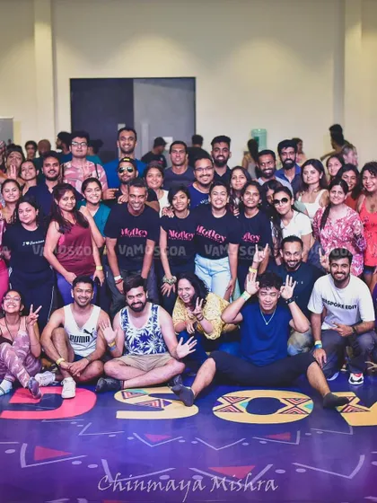 A group photo with the amazing dancers at Vamos Goa. The energy was incredible.