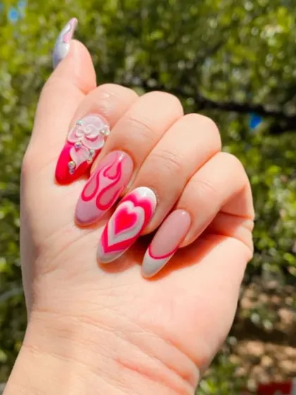 A trendy and bold design featuring "aura" style hearts, flame details, and a 3D sculpted rose with rhinestone accents.