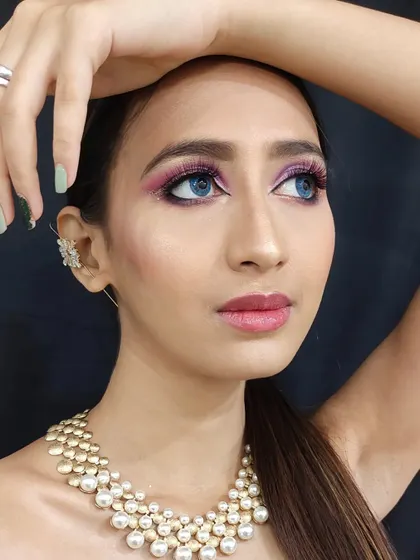 A close-up on the pink glitter cut-crease, showing the precise application and blending of colors that I teach in my glam workshops.