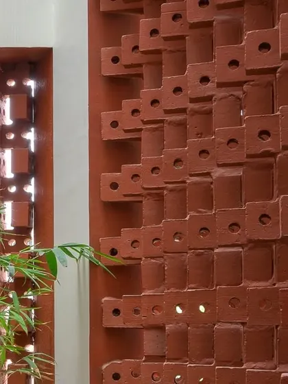Another detail of the intricate brickwork. The pattern is designed to be a modern interpretation of traditional jali screens, blending heritage with contemporary architecture.