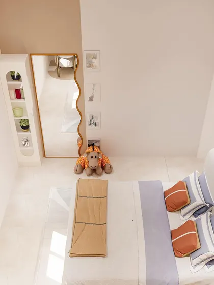Another angle of the kid's room, highlighting the simplicity and functionality of the design.