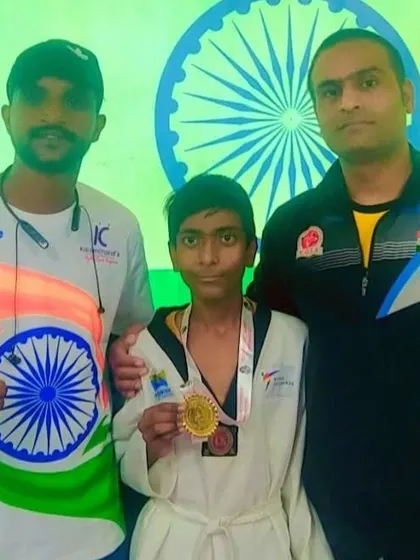 My student Prashant with his gold medal from the South District Taekwondo Championship. A great victory.