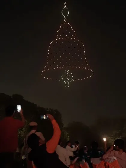 A temple bell formation rings in the celebrations at Dilli Deepotsav. Each formation is carefully designed to resonate with the cultural and spiritual significance of the event.