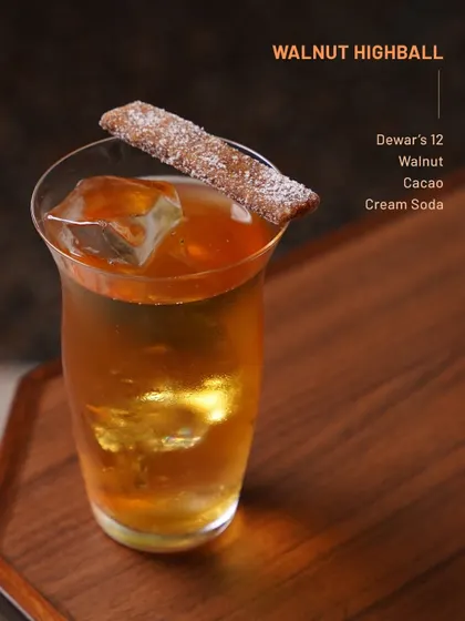 The Walnut Highball, a nutty and complex drink with walnut, cacao, and cream soda.