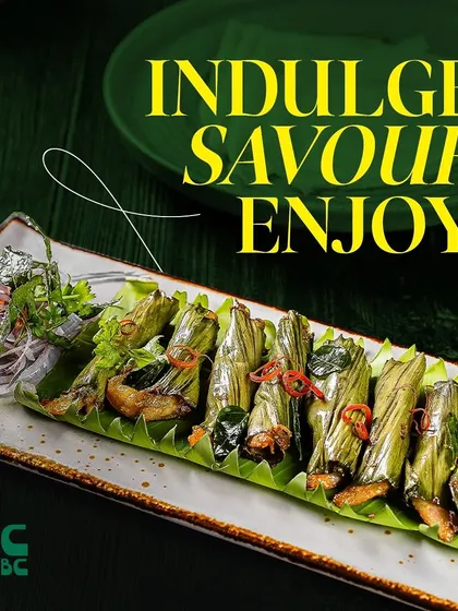 Indulge in this local delicacy of fish wrapped and cooked in pandan leaves, locking in all the flavor and aroma.