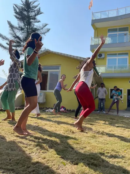 Finding moments of spontaneous dance and joy during my yoga teacher training in Rishikesh. This is the exact feeling of freedom and community I aim to create in my own expressive movement sessions.
