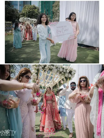 The bride's entry, with flower girls announcing her arrival and guests showering her with petals. We capture the entire entourage and the festive atmosphere.