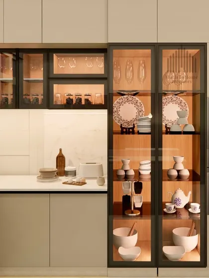 This kitchen render highlights smart storage, with illuminated display cabinets for crockery and integrated ovens, combining functionality with high-end design.