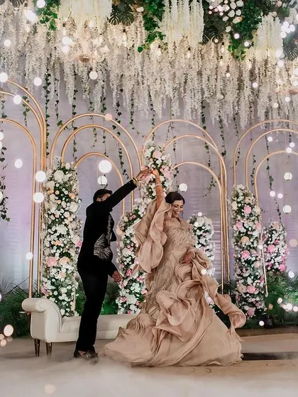 A power couple slaying their reception look. We love capturing the confidence and style of our couples, creating portraits that are both fashionable and full of personality.