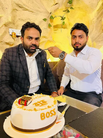 Celebrating my guru's birthday. The cake, shaped like a law book, was a perfect touch for our "boss."
