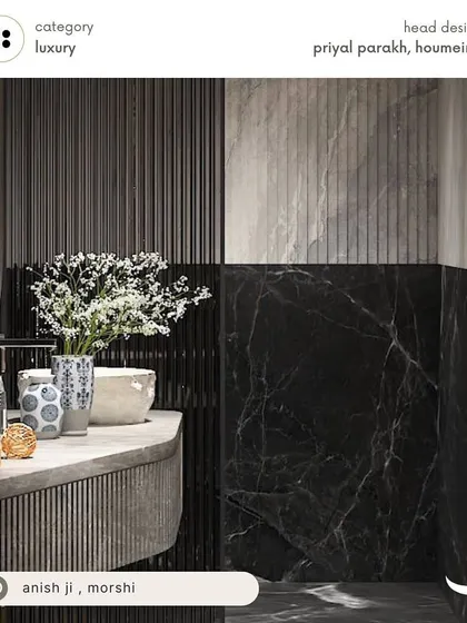 A high-end luxury bathroom for Anish in Morshi, featuring dramatic black marble and fluted wall panels for a dark, sophisticated, and textured design.
