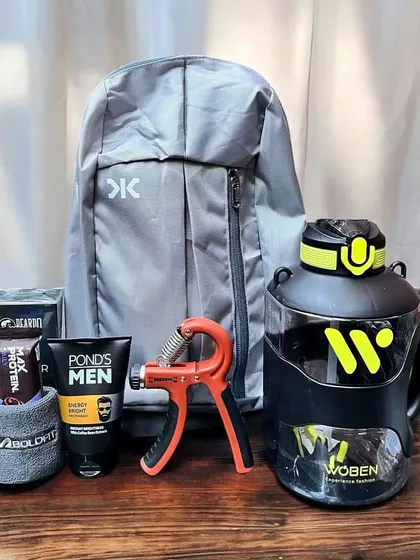 This fitness-themed hamper is perfect for the health-conscious man. It includes a lightweight backpack, a large water gallon, a hand gripper, protein bars, and men's skincare products.