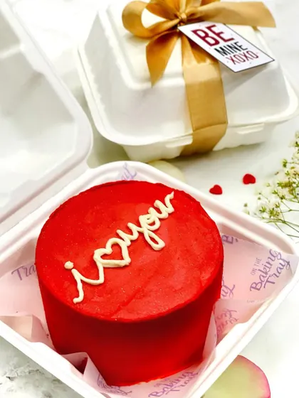 A bold and beautiful red bento cake with "i ❤️ you" piped on top. It's a simple, classic, and delicious way to express your love.