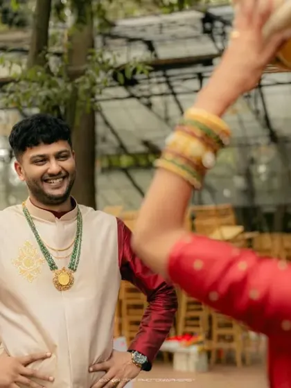 The groom's playful and happy expression as he sees his bride during the ceremony. These are the candid reactions that tell the real story of the day.