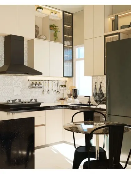 A closer look at this 10ft x 10ft gem. The design maximizes functionality in a small footprint, with a breakfast counter and smart storage solutions. The mix of textures, from the patterned tiles to the fluted glass cabinet, adds big charm to the small space.