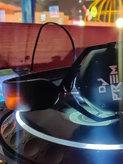 A close-up of my personalized V-MODA headphones on the DJ controller. Having the right professional tools is crucial for monitoring sound and delivering the best possible audio quality.