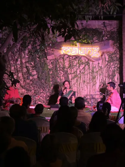 A wide shot of the audience at the Namma Ashram concert. The setting was serene, with listeners seated comfortably to enjoy the evening of music.