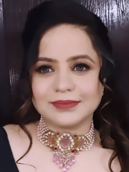 A front-facing view of the soft glam party look, showing the flawless skin finish and defined features.
