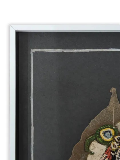 Another detail shot of the framed leaf painting, showing the texture of the leaf against the smooth mat board. Our framing techniques ensure such delicate items are securely mounted and protected.