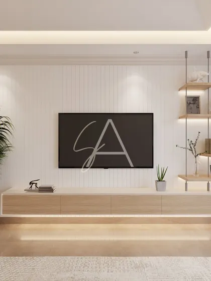 This floating media unit with under-cabinet lighting keeps the bedroom feeling open and uncluttered. The design combines practical storage with a clean, minimalist aesthetic.